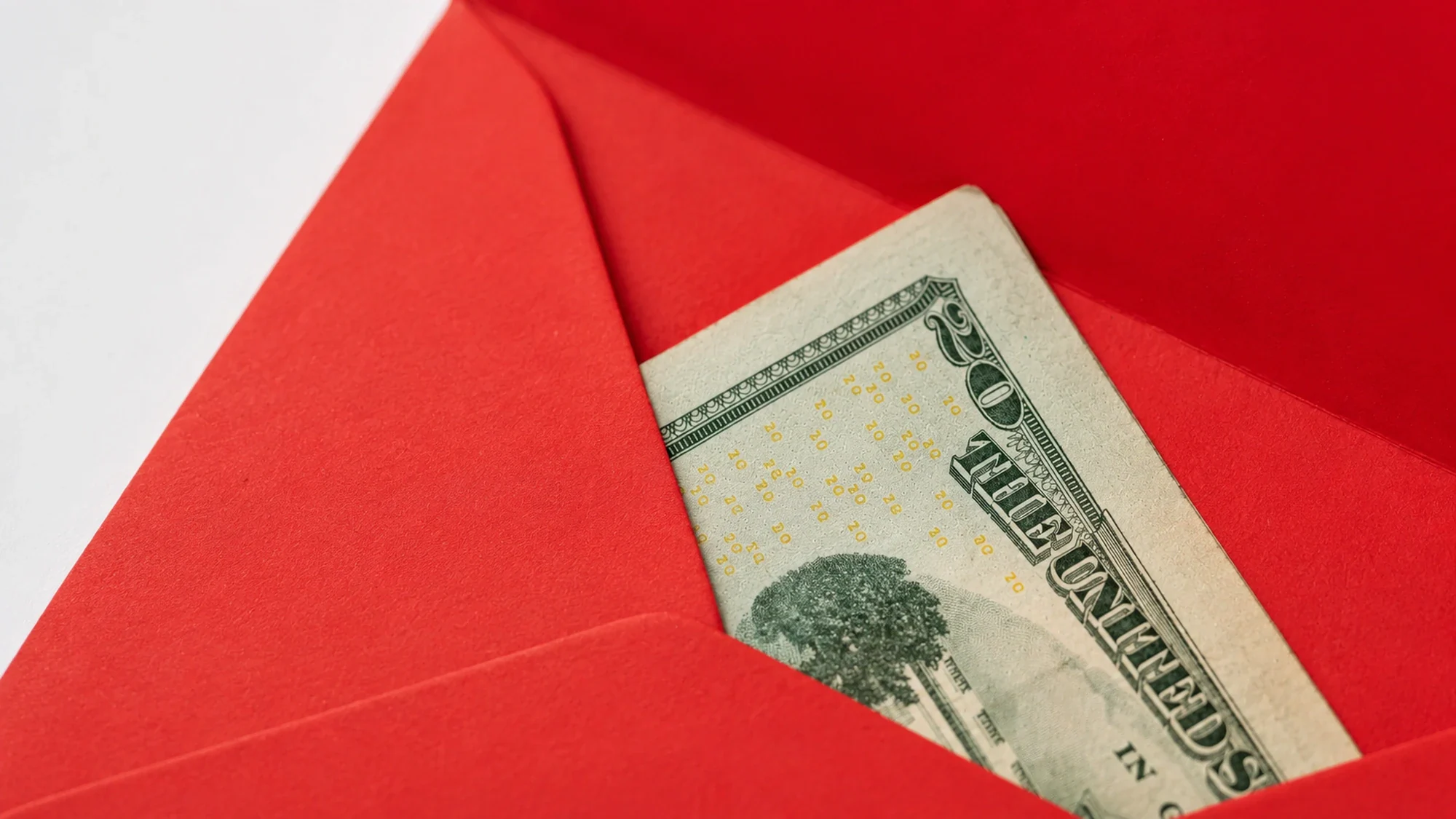 Cash gift placed in an envelope
