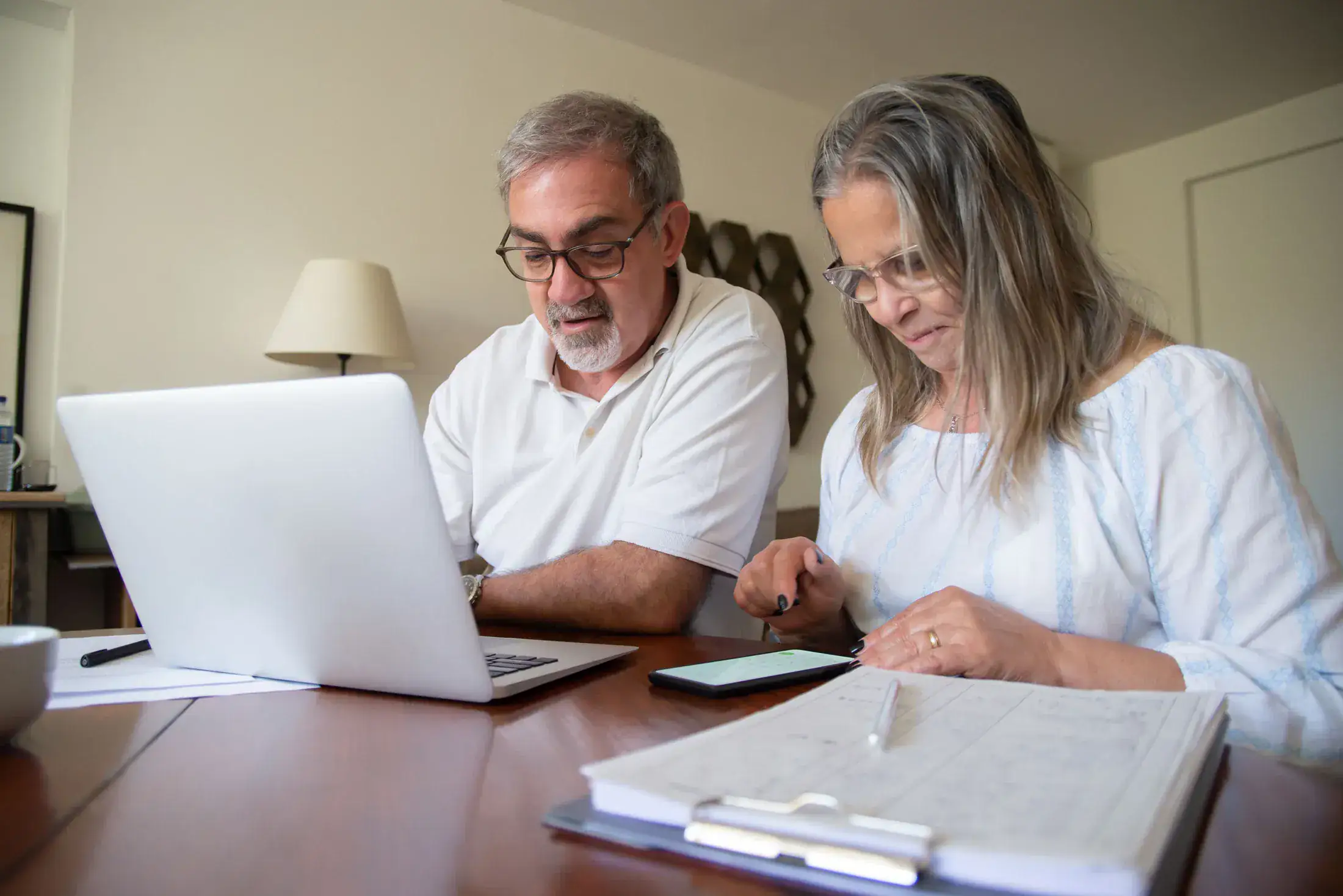 Older couple reviewing retirement finances together